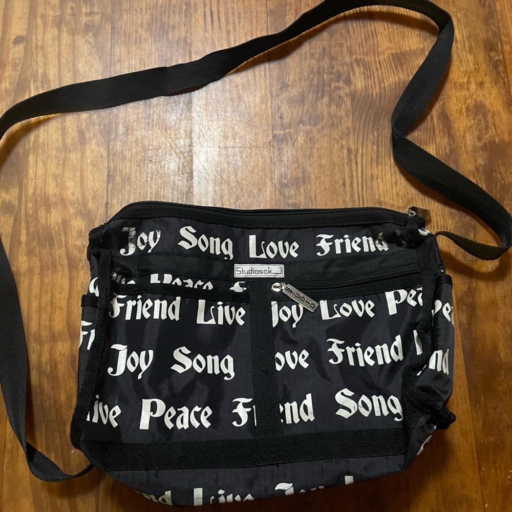 Studiosak Script Print Cross Body  joy love peace friend song black & white
